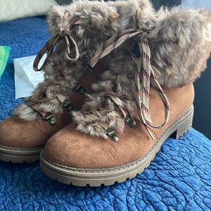 Like New! Cute fuzzy booties with tread. .5 Heel